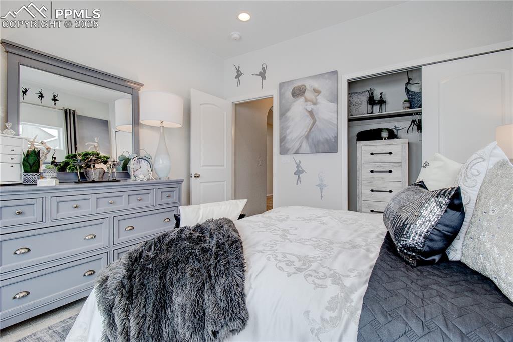 Image 16 of 32: Bedroom with a closet