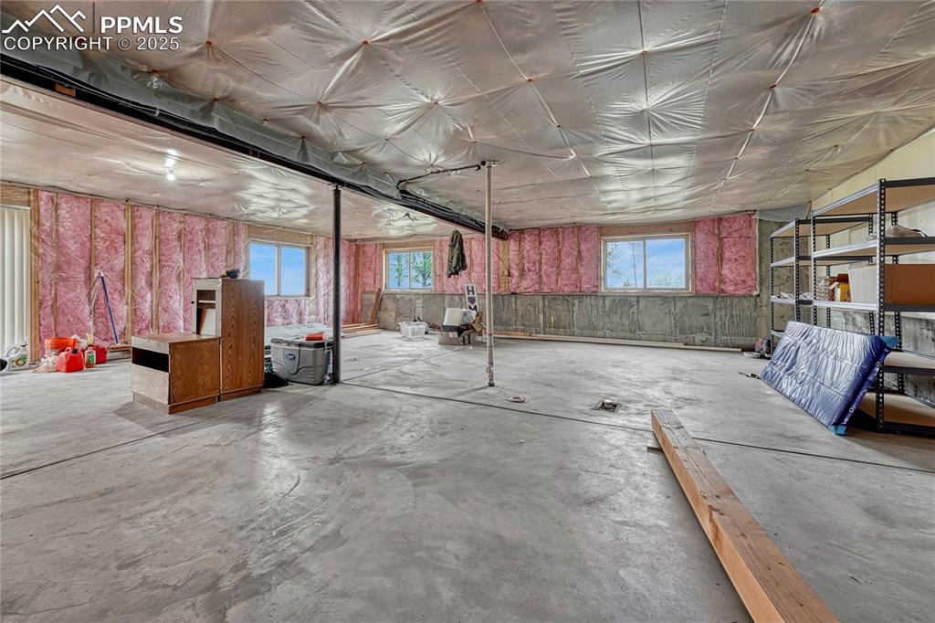 Image 36 of 43: Below grade area featuring plenty of natural light