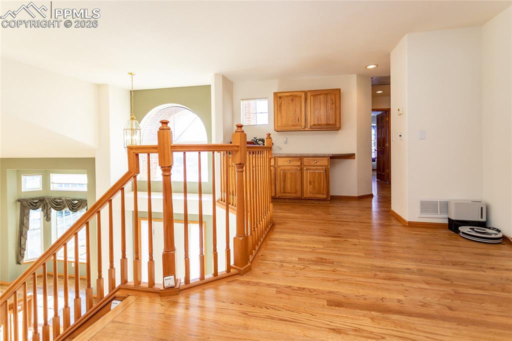 Image 32 of 50: Lofts overlooks the entrance foyer