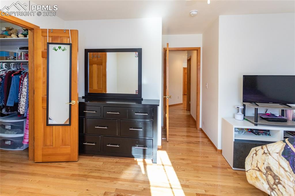 Image 45 of 50: Fourth bedroom with walk-in closet