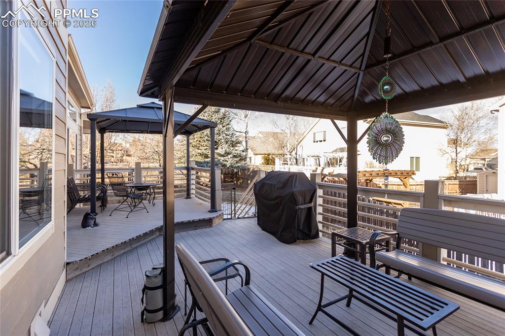 Image 6 of 50: Tiered double deck with composite decking includes the 2 gazebos