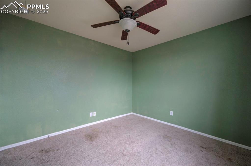 Image 32 of 43: Carpeted empty room featuring a smoke detector, baseboards, and a ceiling f