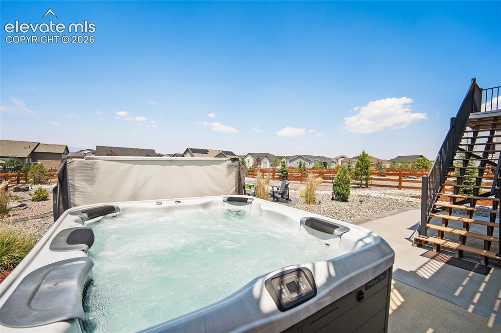 Image 43 of 47: Outdoor bullfrog spa with