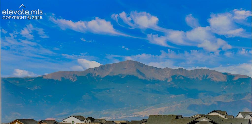 Image 47 of 47: Spectacular Pikes Peak Mountain backdrop with a clear blue sky