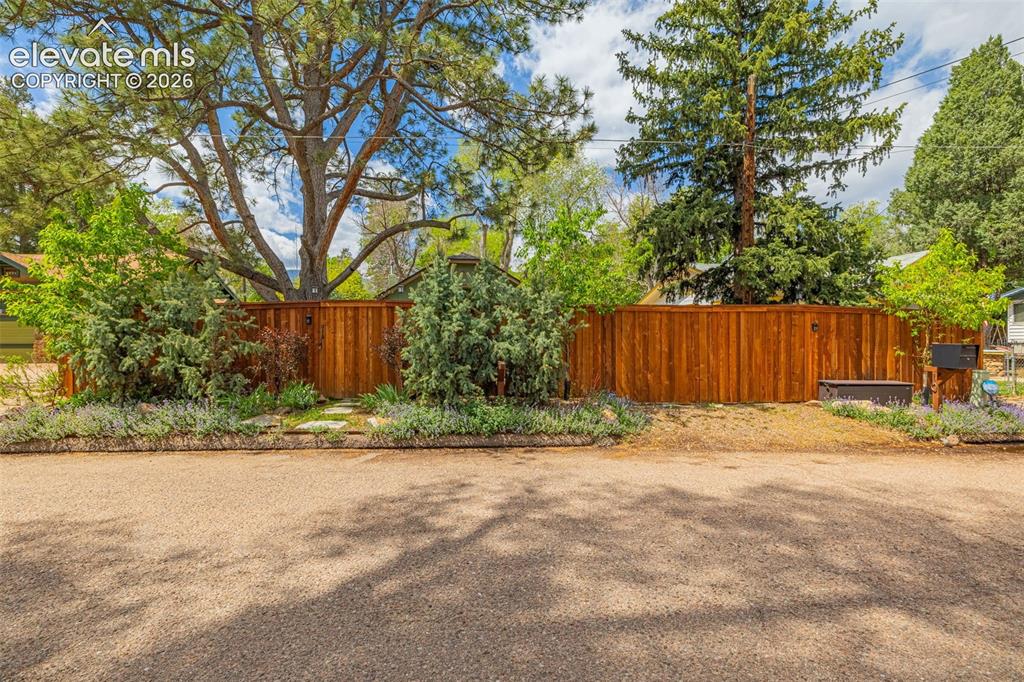Image 30 of 44: gate to enter property