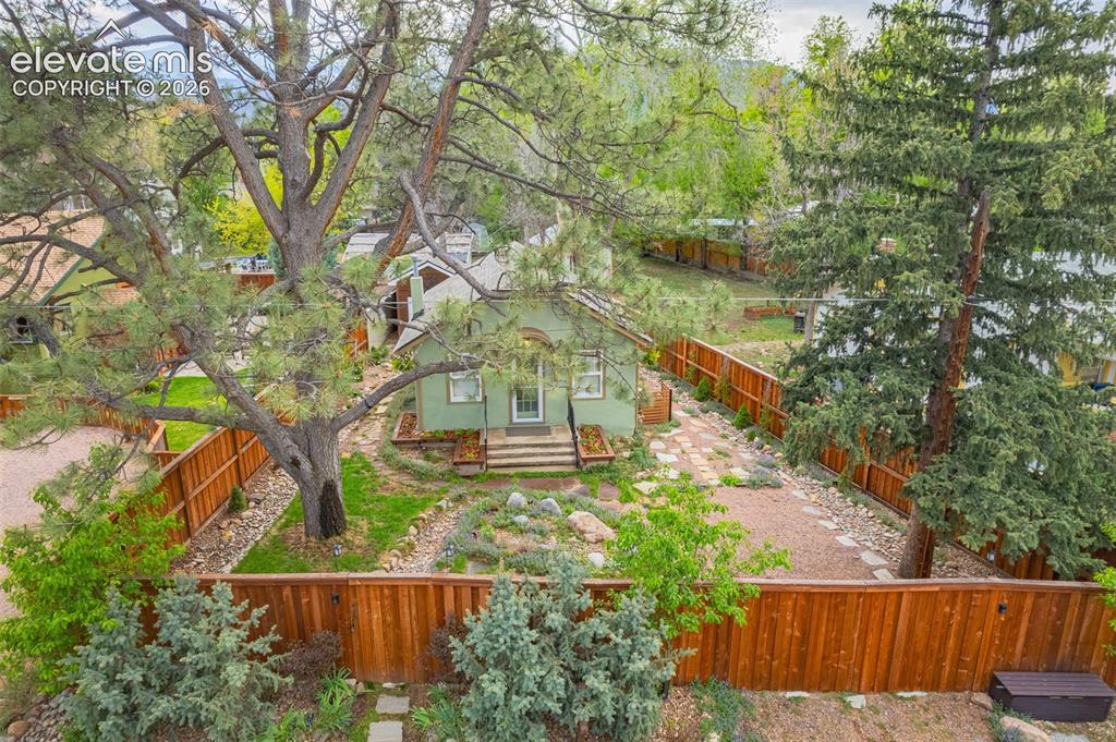 Image 4 of 44: entire property has privacy fence