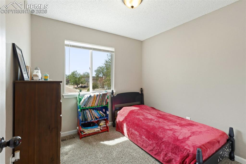 Image 27 of 37: Bedroom