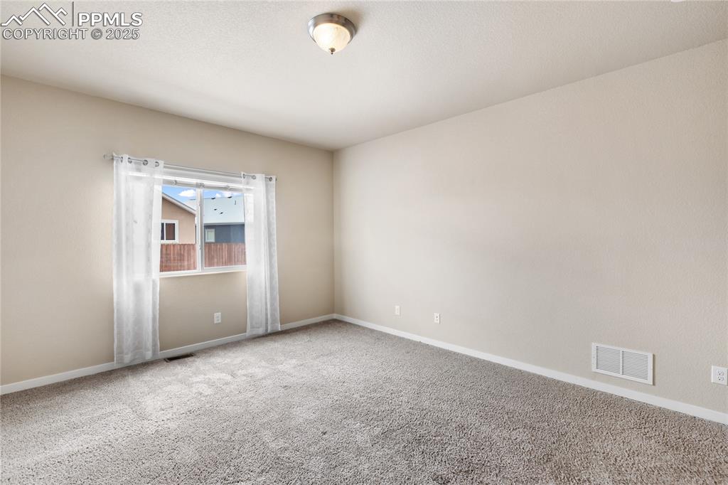 Image 13 of 31: The windows make it bright but cozy!