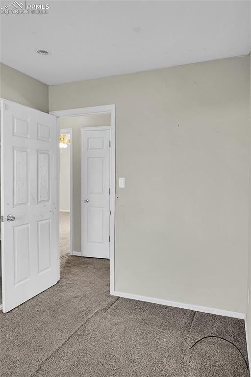 Image 12 of 33: Main level bedroom 3