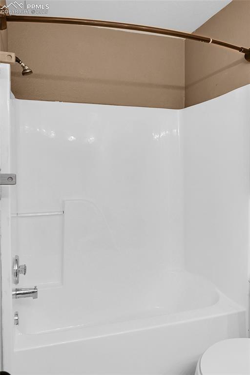 Image 16 of 33: Main level bathroom