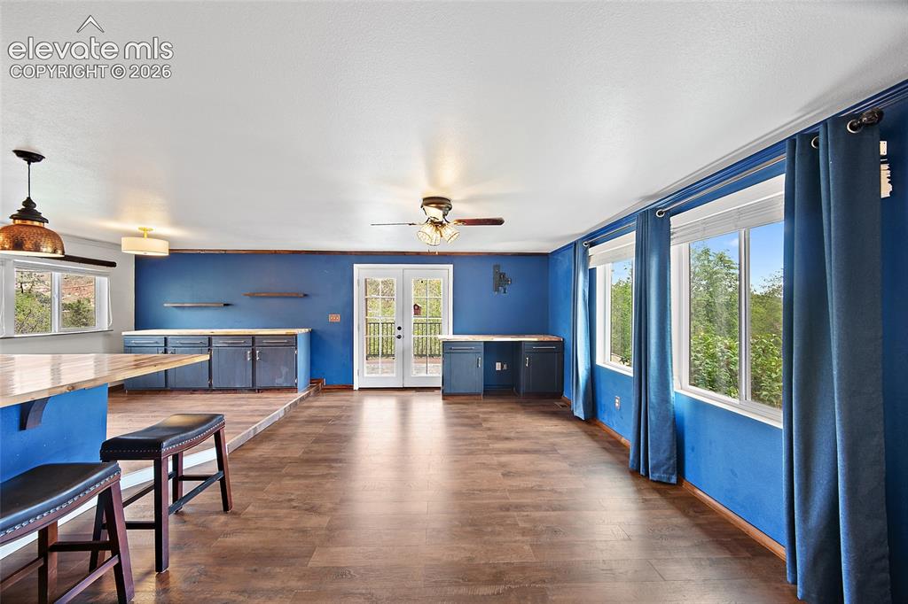 Image 12 of 49: family area opens to kitchen and dining 