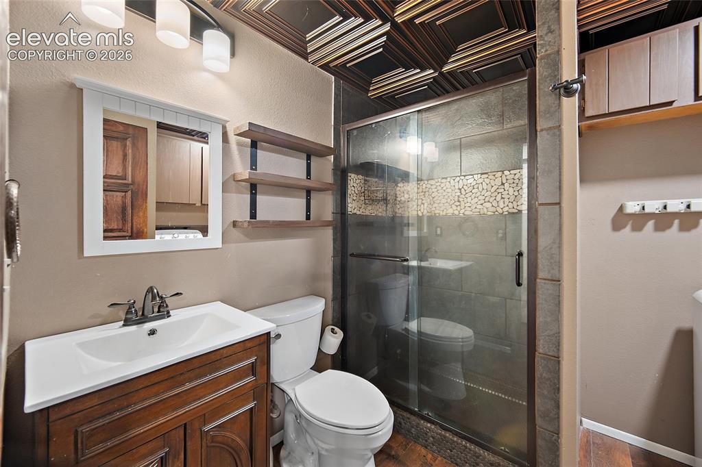 Image 23 of 49: Main level bathroom