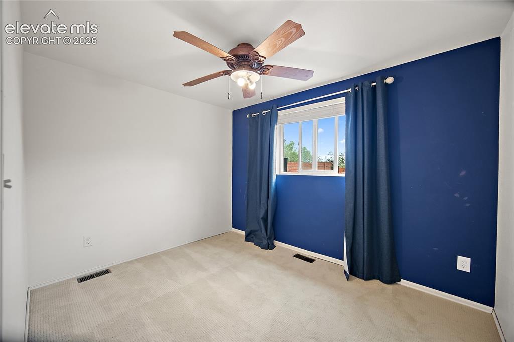 Image 26 of 49: Main level bedrom