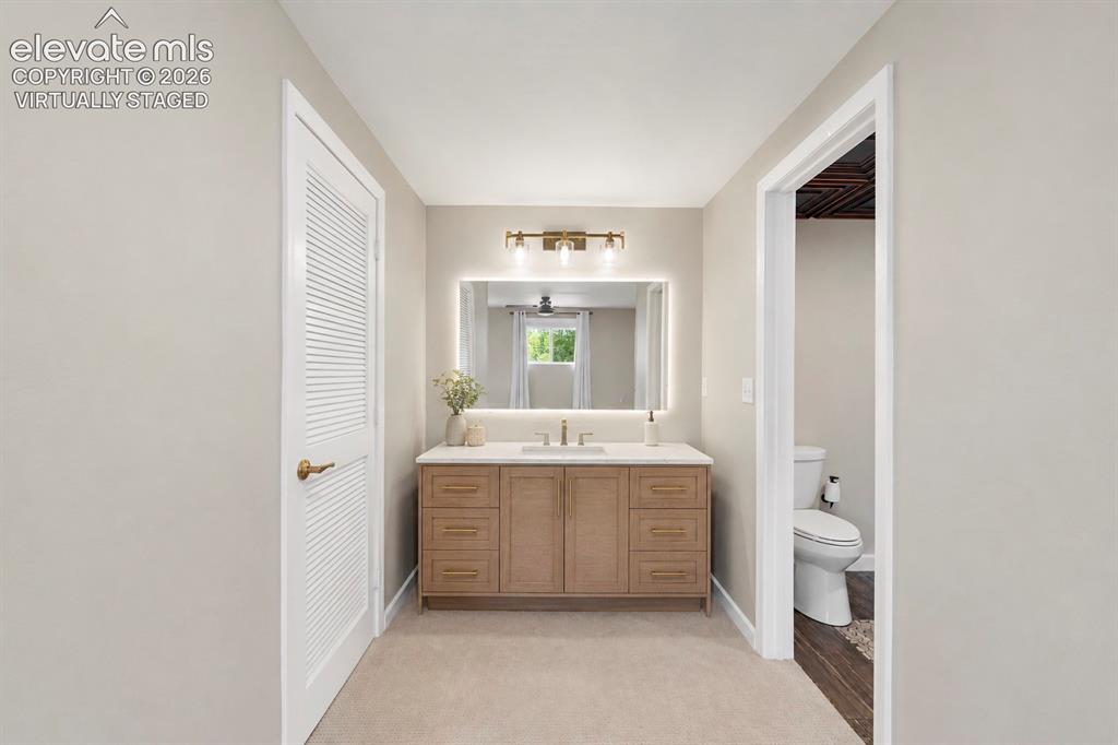 Image 29 of 49: Primary bathroom (virtually staged and painted)