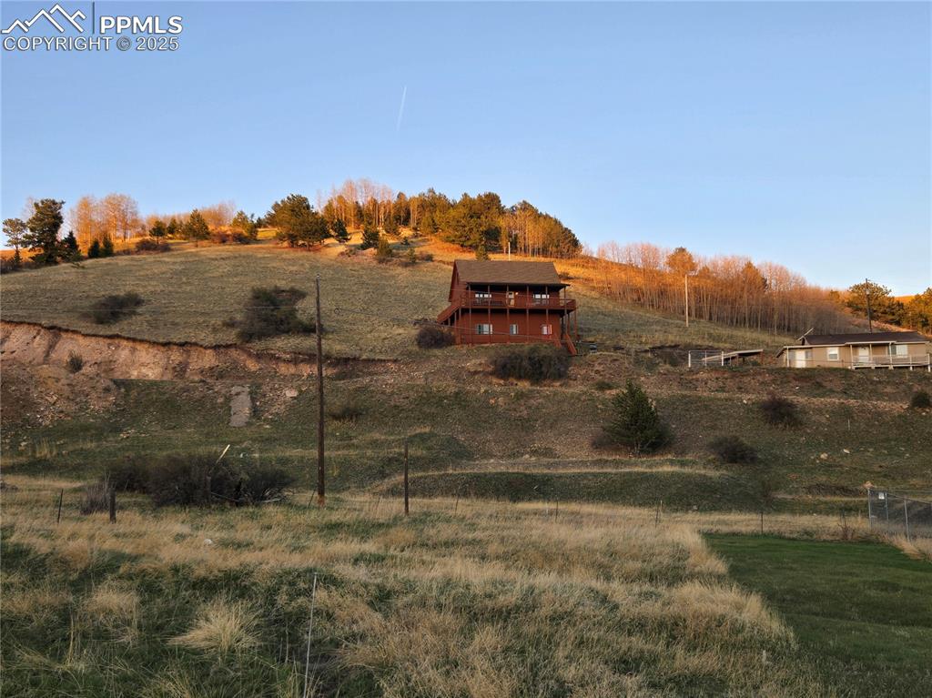 Image 7 of 10: View of yard with a view of rural / pastoral area