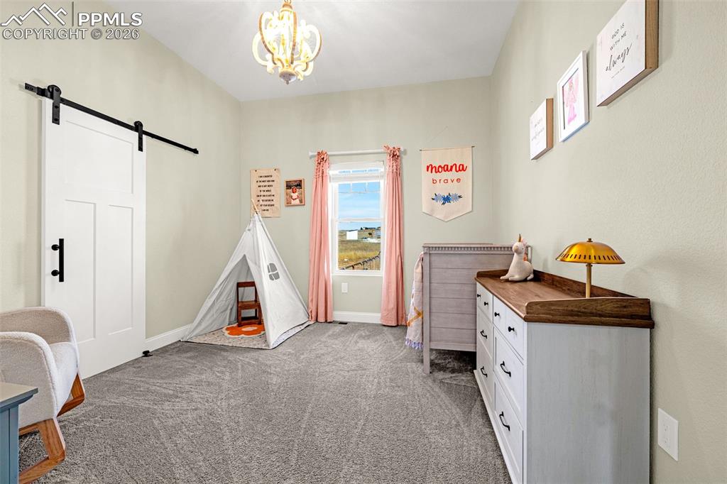 Image 23 of 50: Bedroom