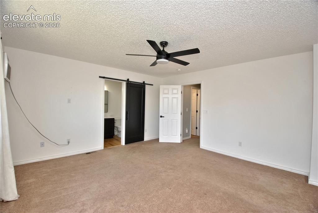 Image 16 of 28: Master Bedroom