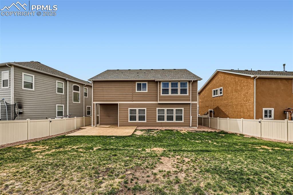 Image 29 of 29: Rear view of property featuring a patio