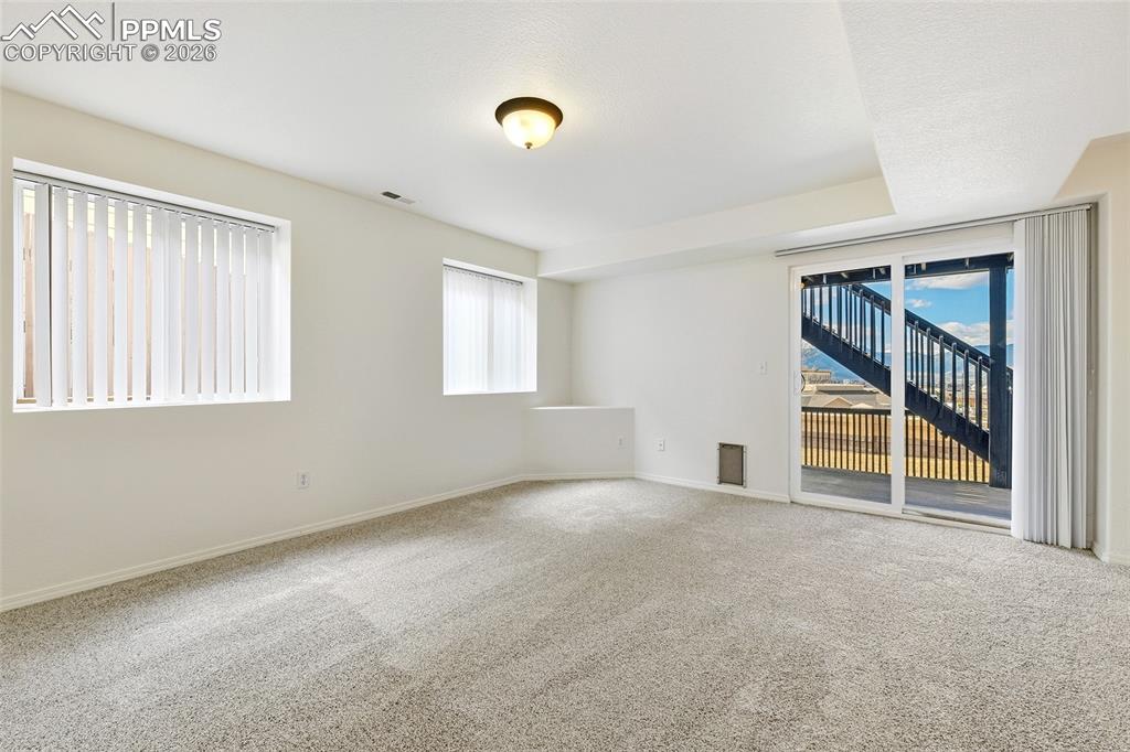 Image 31 of 41: Walkout to backyard!