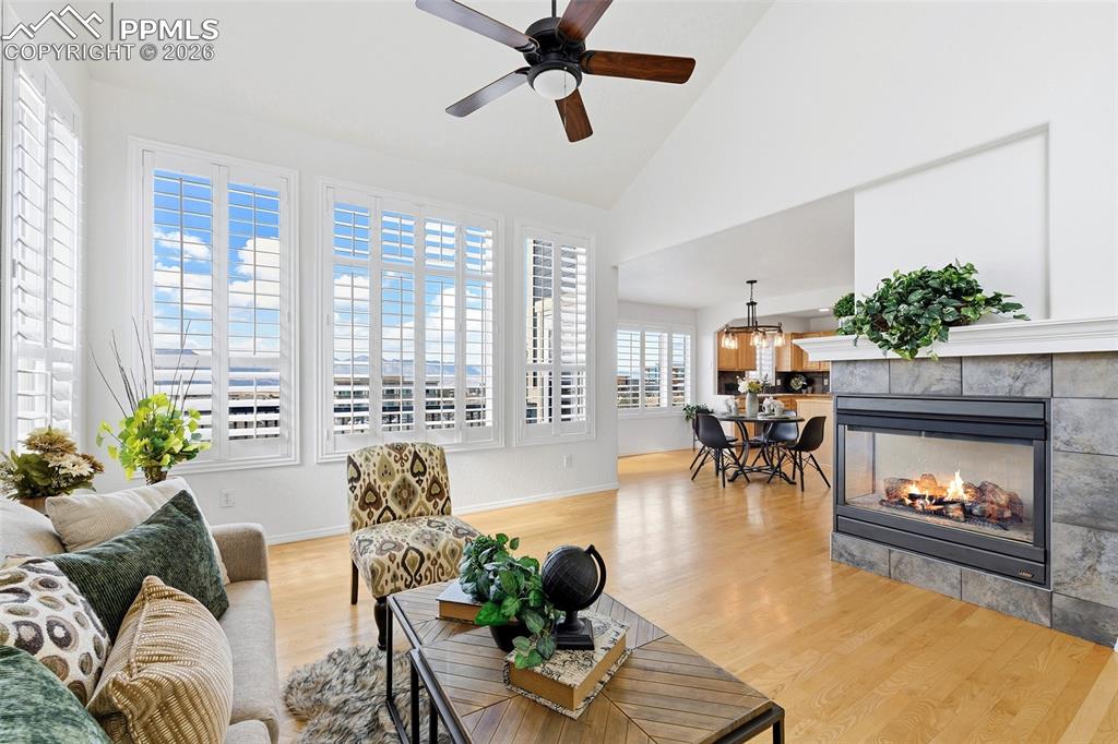 Image 7 of 41: Enjoy the views and the two-sided gas fireplace