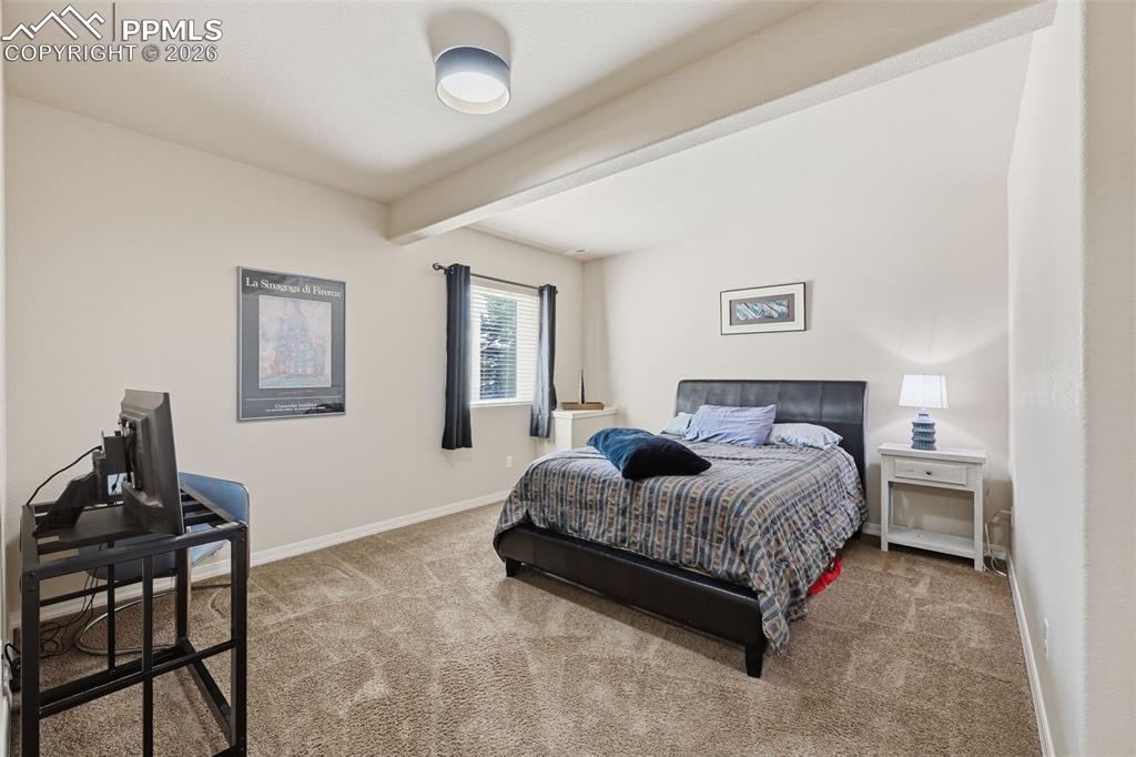 Image 30 of 41: Basement bedroom