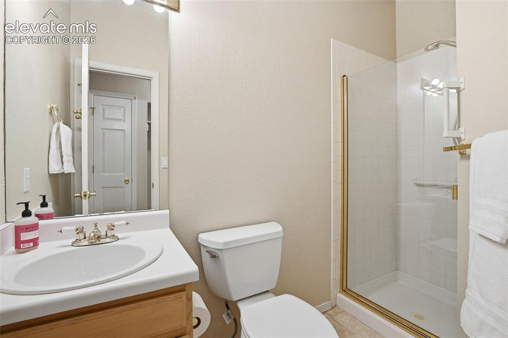 Image 19 of 40: 3/4 bath on the main just before the 3 car garage
