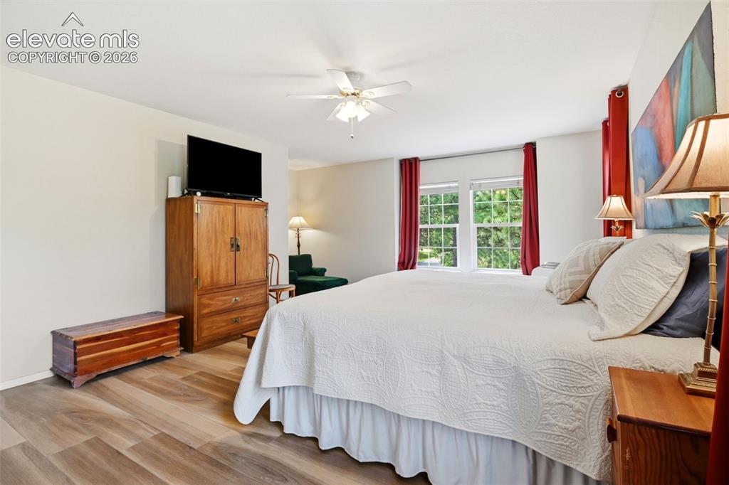 Image 23 of 40: Primary bedroom has a little nook/sitting area or could easily become an ex
