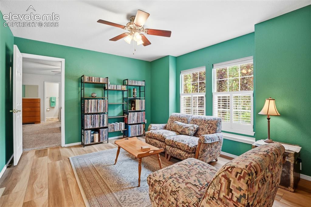 Image 31 of 40: Upstairs sitting room (originally a bedroom) leads to the upstairs bedroom