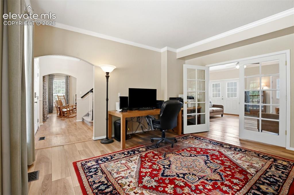 Image 7 of 40: French doors lead to the family / great room