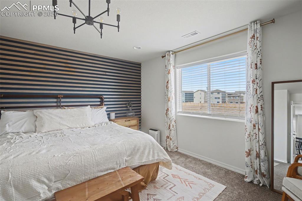 Image 24 of 38: Bedroom