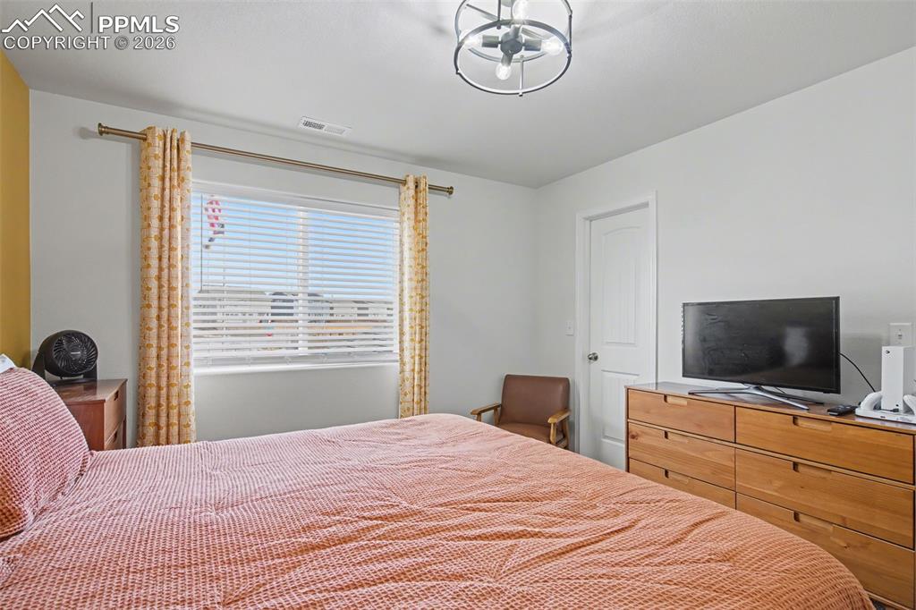 Image 31 of 38: Bedroom