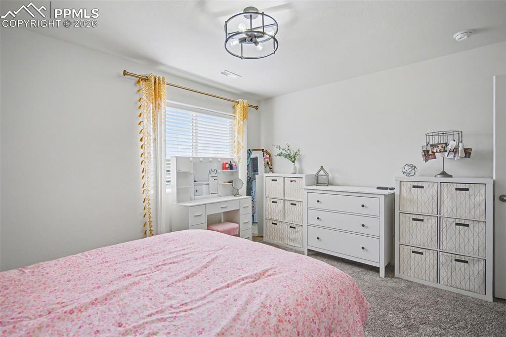 Image 34 of 38: Bedroom