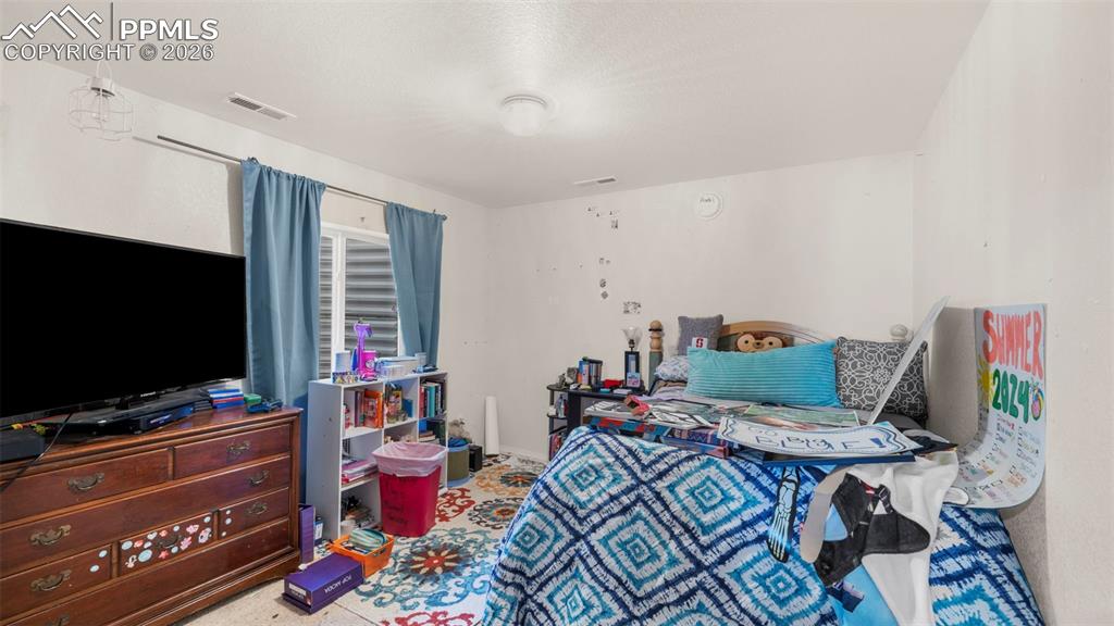 Image 29 of 33: Bedroom