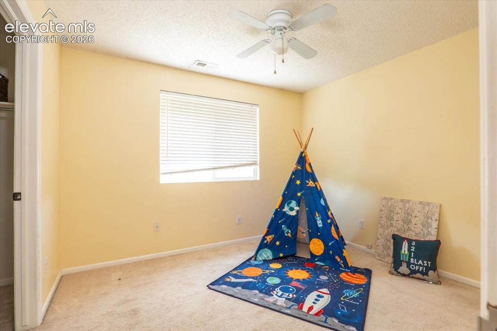 Image 18 of 36: Guest room #2 with large walk-in closet