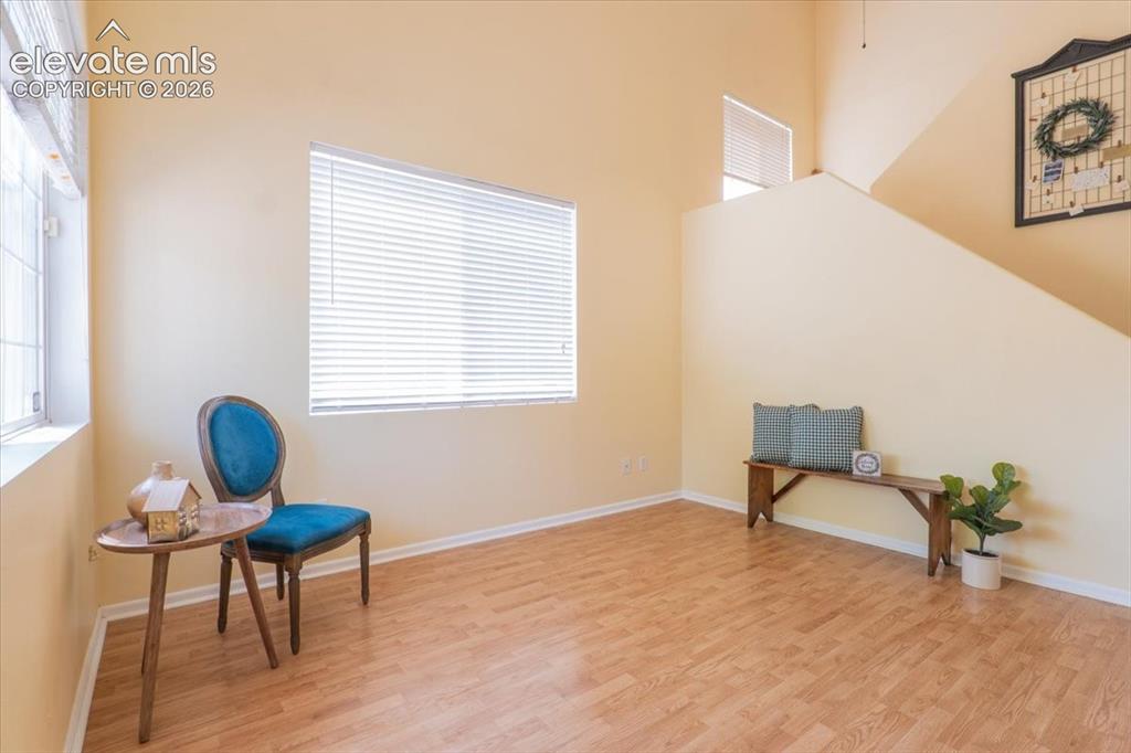 Image 6 of 36: Vaulted ceilings, option to use as formal living or dining, or would be a g