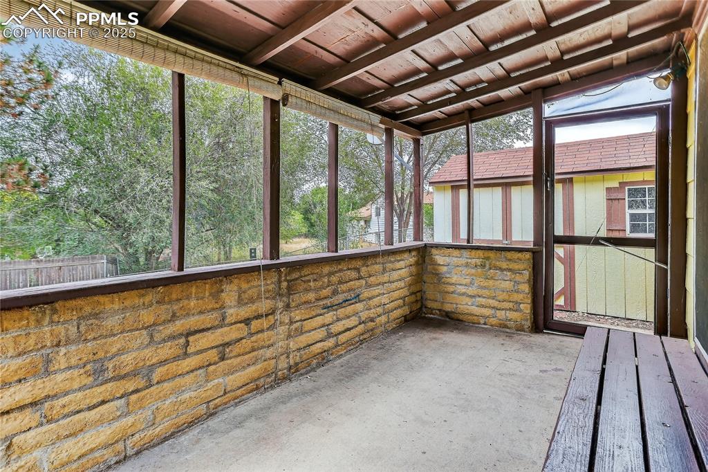 Image 11 of 15: Enclosed patio