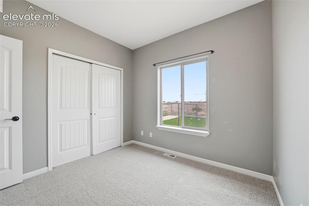 Image 13 of 29: Bedroom