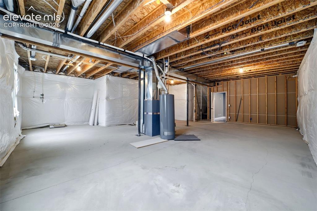Image 24 of 29: Unfinished basement
