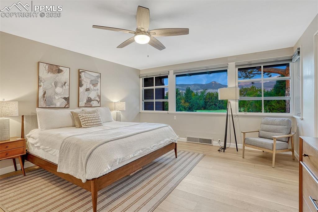 Image 11 of 46: Rift and quartersawn 6" white oak hardwood floors throughout most of home. 