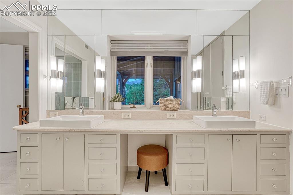 Image 15 of 46: Dual Vanities with historic charm.