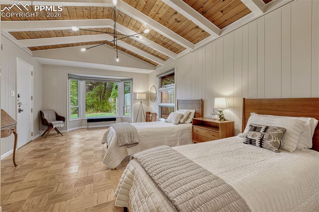 Image 23 of 46: Large bedrooms with dutch door to backyard. Refinished floors. 