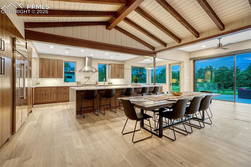 Image 33 of 46: Dining area adjoining the living space, framed by stunning views and perfec