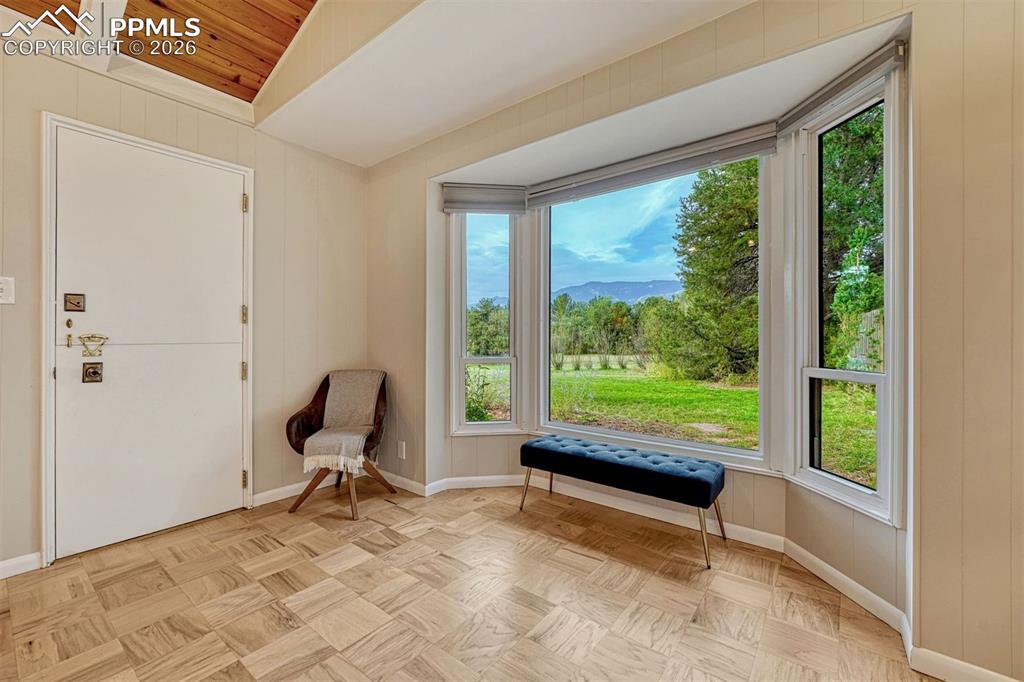Image 35 of 46: Bay window facing backyard in north bedroom.