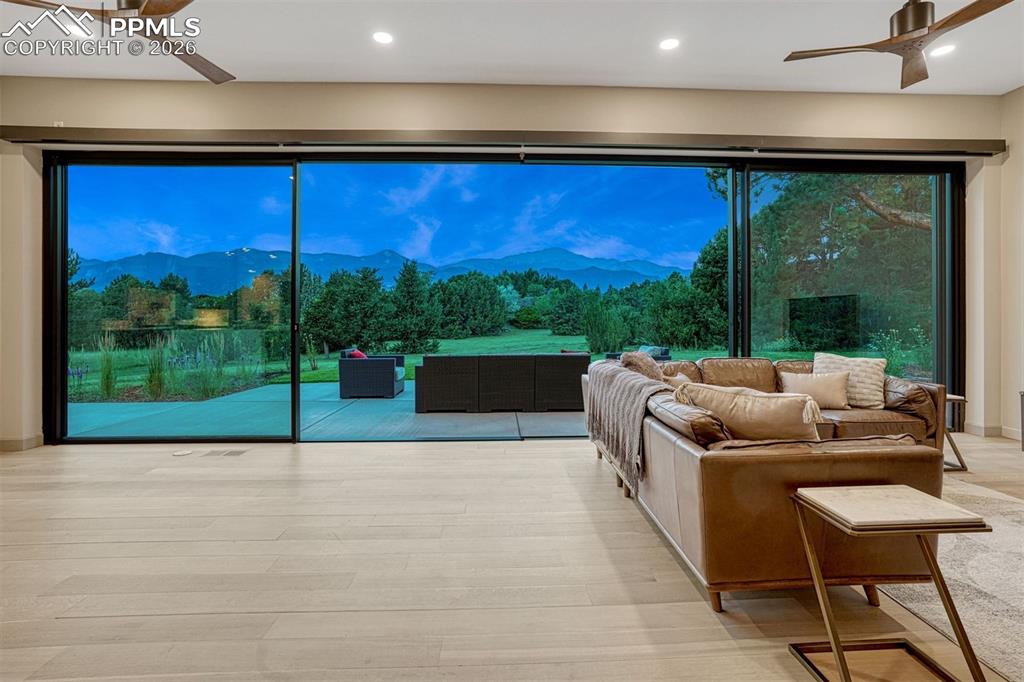 Image 36 of 46: Ever-changing skies and expansive backyard views create a serene, open sett