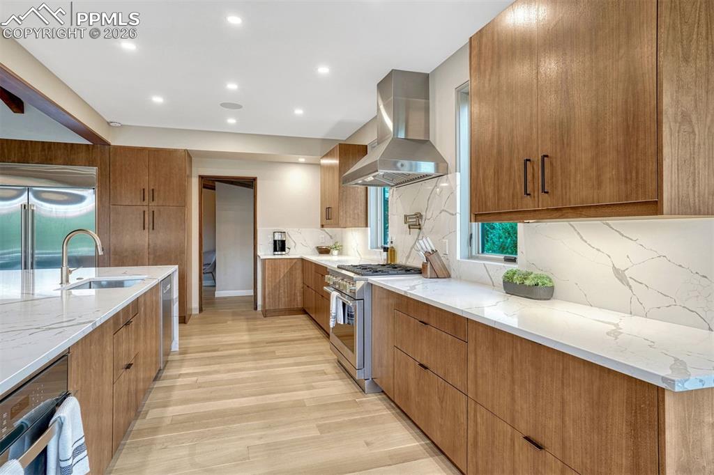 Image 4 of 46: Monogram 48" built in refrigerator, 36" gas range, 13