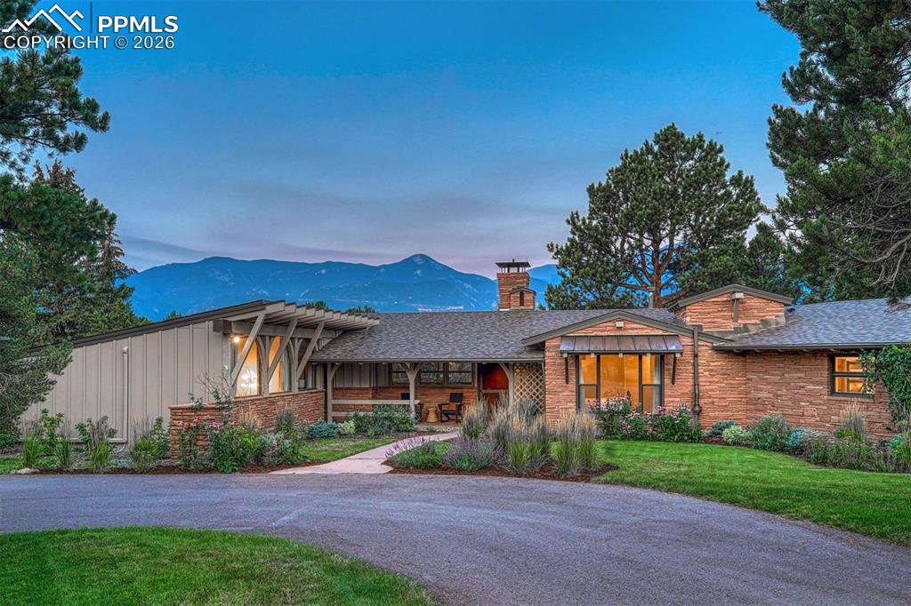 Image 43 of 46: Circular driveway designed for convenience and elegance at every arrival.