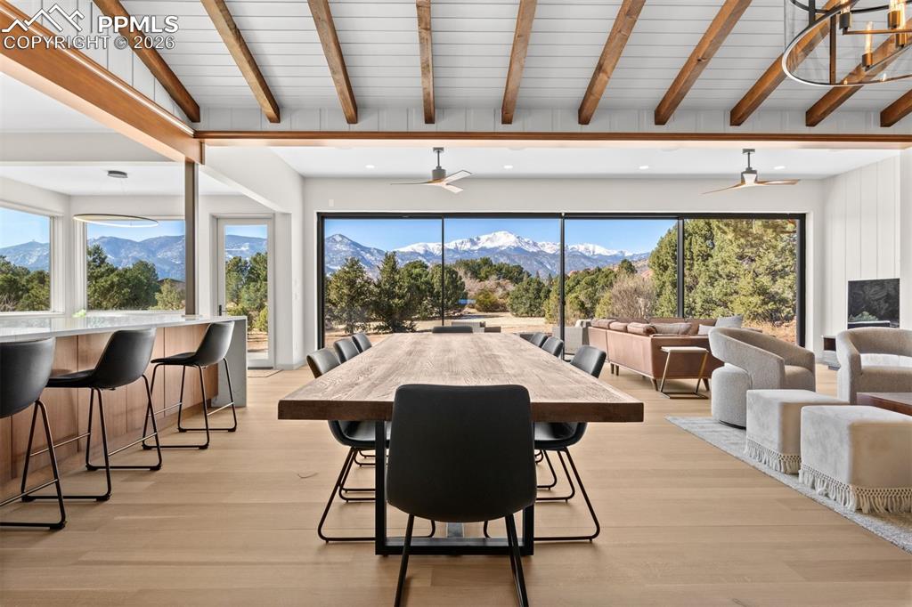 Image 9 of 46: Seamlessly connected to the living area, this dining space offers expansive