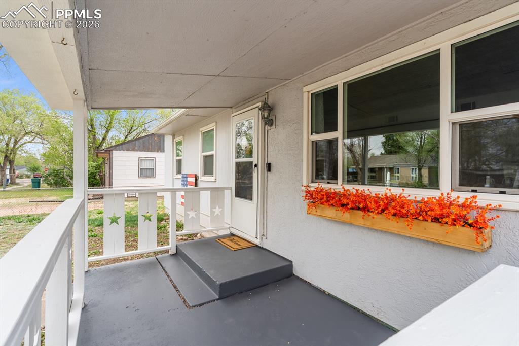 Image 2 of 32: Covered front porch!