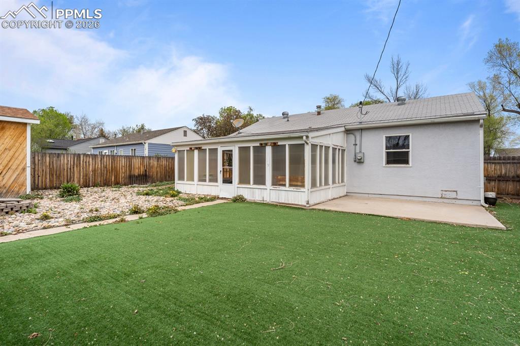Image 23 of 32: Back concrete patio!