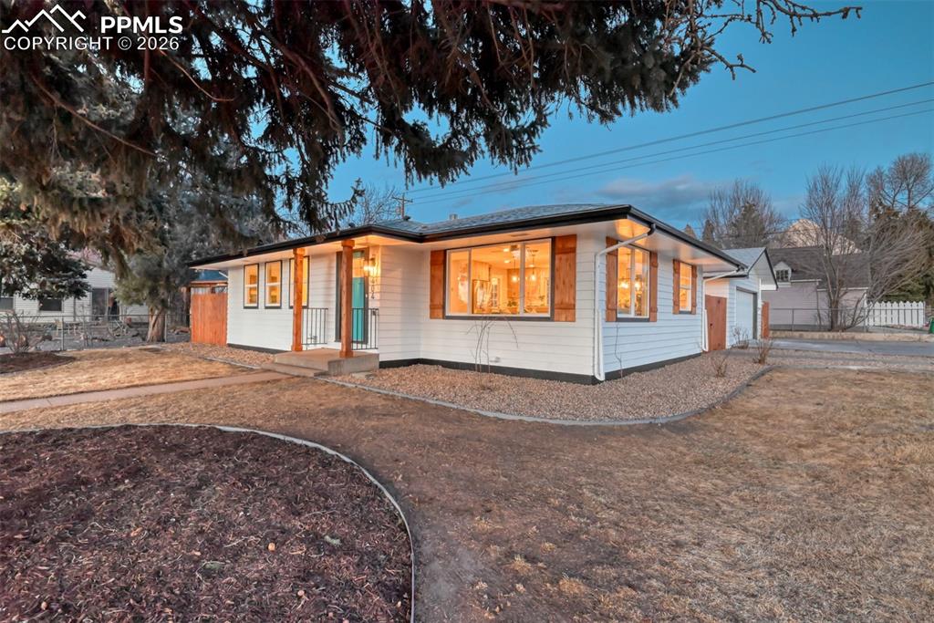 Image 2 of 35: Single story home with a garage